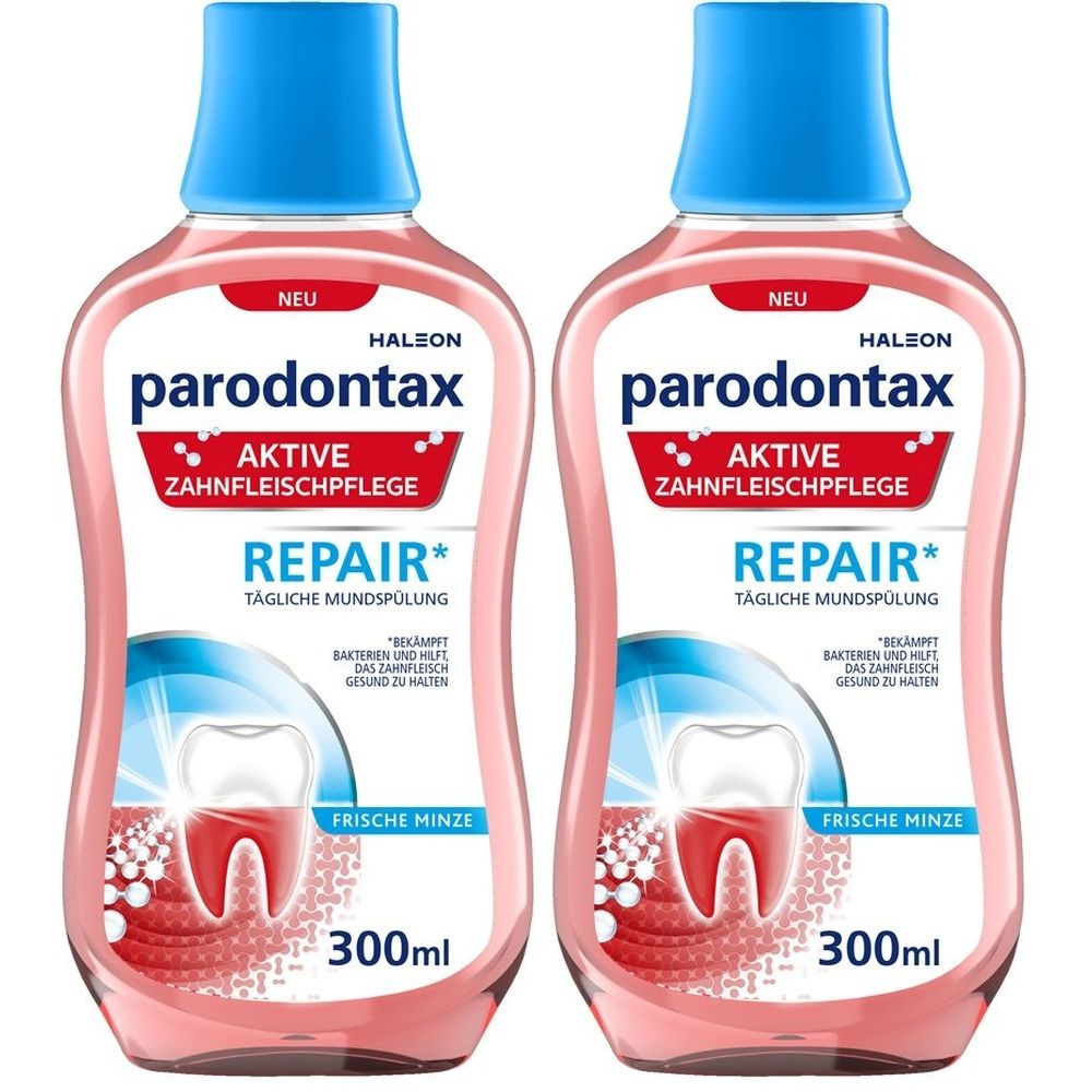 Zwei Flaschen parodontax Aktive Zahnfleischpflege REPAIR Mundspülung. Rosa Flüssigkeit, blaue Kappe. Aufschrift: Frische Minze, 300ml.