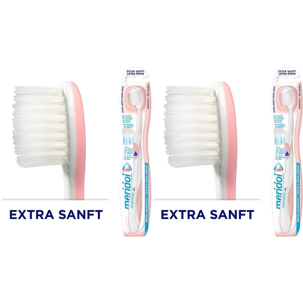 Zahnbürste mit rosa Griff und weißen Borsten. Verpackung mit Produktinformationen. Aufschrift: EXTRA SANFT.