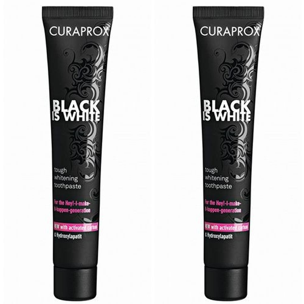 Zwei schwarze Zahnpasta-Tuben. Aufschrift: CURAPROX, BLACK IS WHITE. Enthält Aktivkohle und Hydroxylapatit. Weißmacher-Zahnpasta.