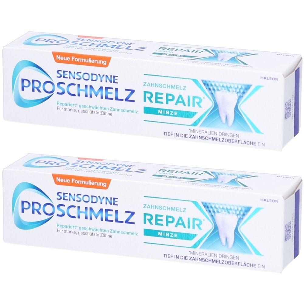 Zwei Tuben Sensodyne ProSchmelz Zahnpasta. Weiße Verpackung mit blauer und türkiser Schrift. Aufschrift: REPAIR, MINZE.