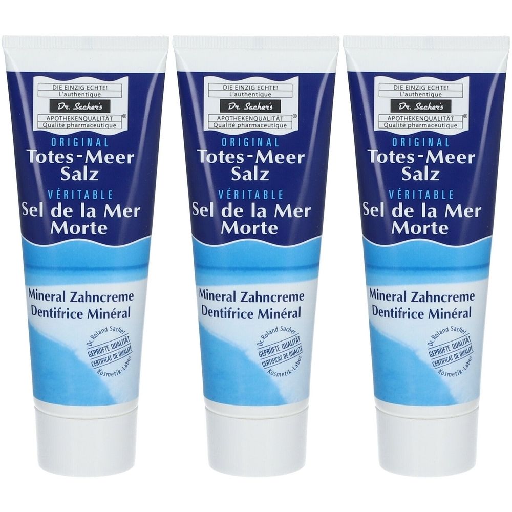 Drei Tuben Mineral Zahncreme. Blaue und weiße Verpackung. Text: Totes-Meer Salz, Sel de la Mer Morte, Mineral Zahncreme.