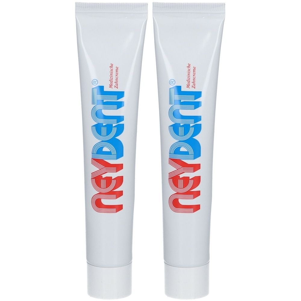 Zwei weiße Tuben Neydent Zahncreme. Der Schriftzug Neydent ist rot und blau. Aufschrift: Medizinische Zahncreme.
