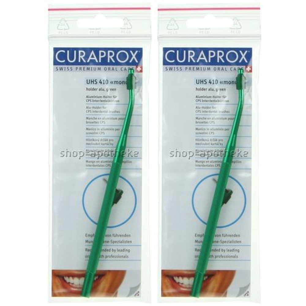 Zwei grüne Curaprox Halter UHS 410 mono in transparenter Verpackung. Text: CURAPROX, UHS 410 mono.
