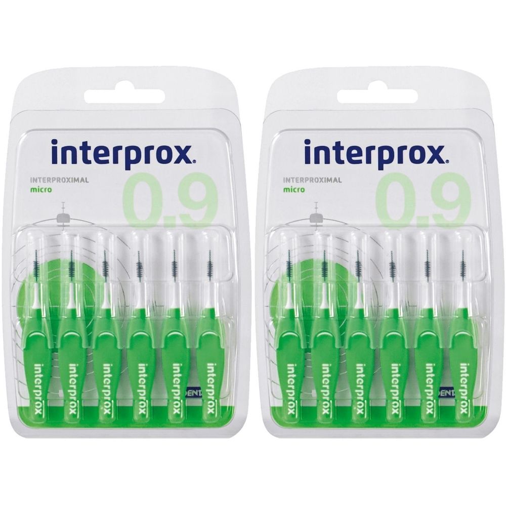 Zwei Blisterpackungen mit grünen Interdentalbürsten. Auf jeder Packung steht "interprox" und "0.9".