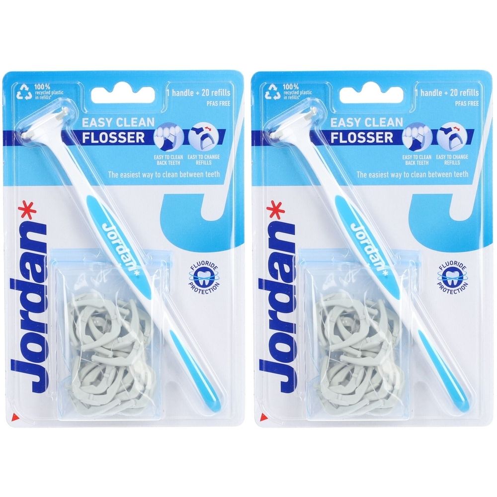 Zwei Packungen Jordan Flosser. Jede Packung enthält einen Griff und Nachfüllpackungen. Blaue und weiße Verpackung mit Produktnamen.