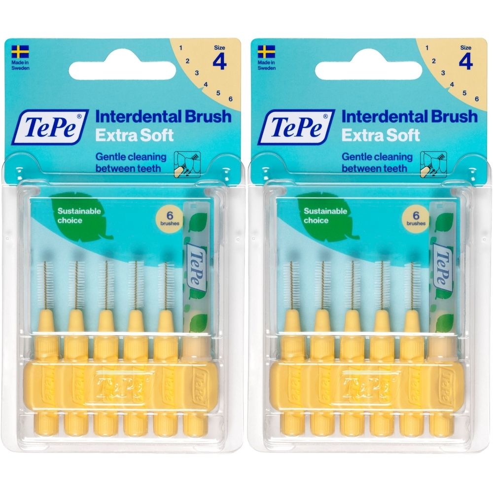 Zwei Packungen Interdentalbürsten. Gelbe Bürsten mit gelben Griffen. Verpackung mit Produktnamen und Größenangabe.