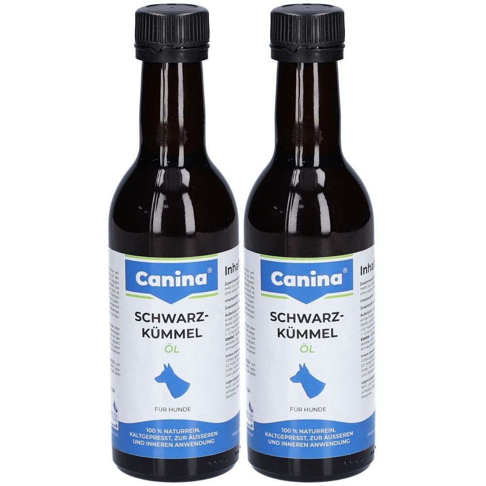 Zwei braune Flaschen mit schwarzem Deckel. Auf dem Etikett steht "Canina Schwarzkümmel Öl". Blaue Hundesilhouette.
