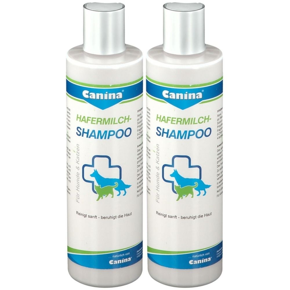 Zwei weiße Flaschen mit silbernen Deckeln. Auf jeder Flasche steht "Canina HAFERMILCH-SHAMPOO" und ein Logo mit Hund und Katze.