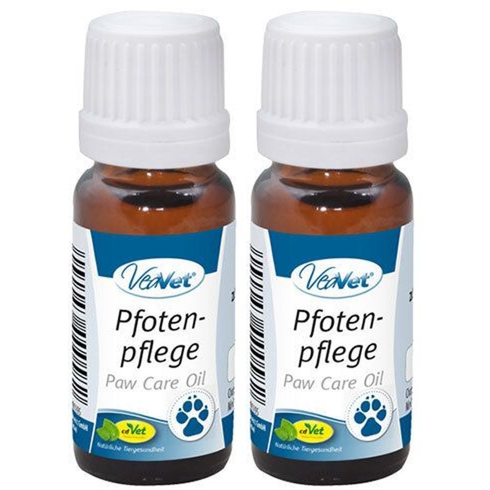 Zwei braune Glasflaschen mit weißem Deckel. Auf dem Etikett steht "VeVet Pfotenpflege Paw Care Oil".