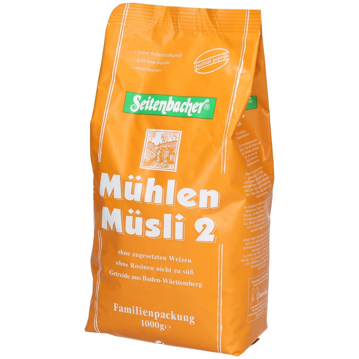 Orangefarbene Verpackung von Seitenbacher Mühlen-Müsli 2. Aufschrift: Mühlen Müsli 2, ohne Rosinen, Familienpackung, 1000g.