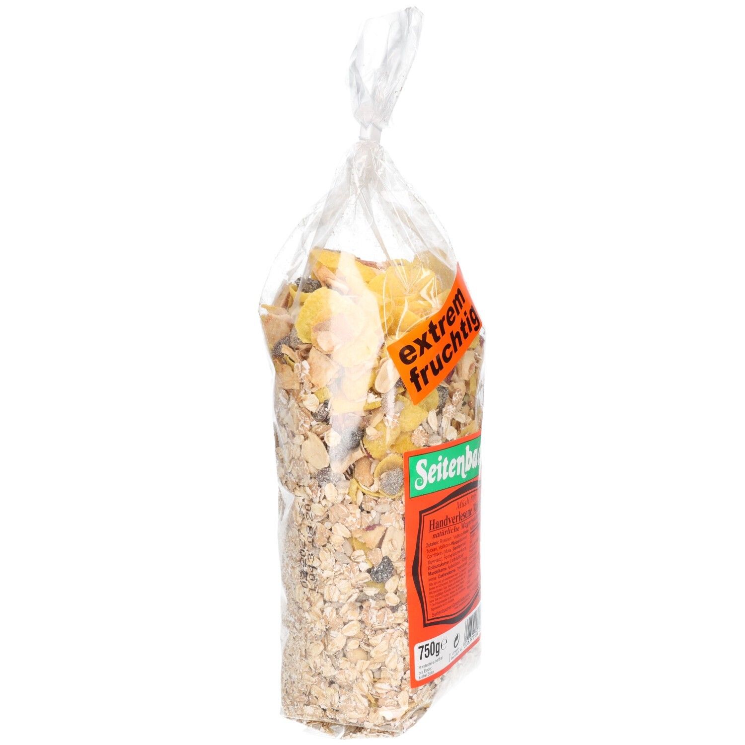 Seitenansicht einer transparenten Tüte mit Müsli. Aufkleber "extrem fruchtig". Rotes Etikett mit Text. Marke: Seitenbacher. 750g.