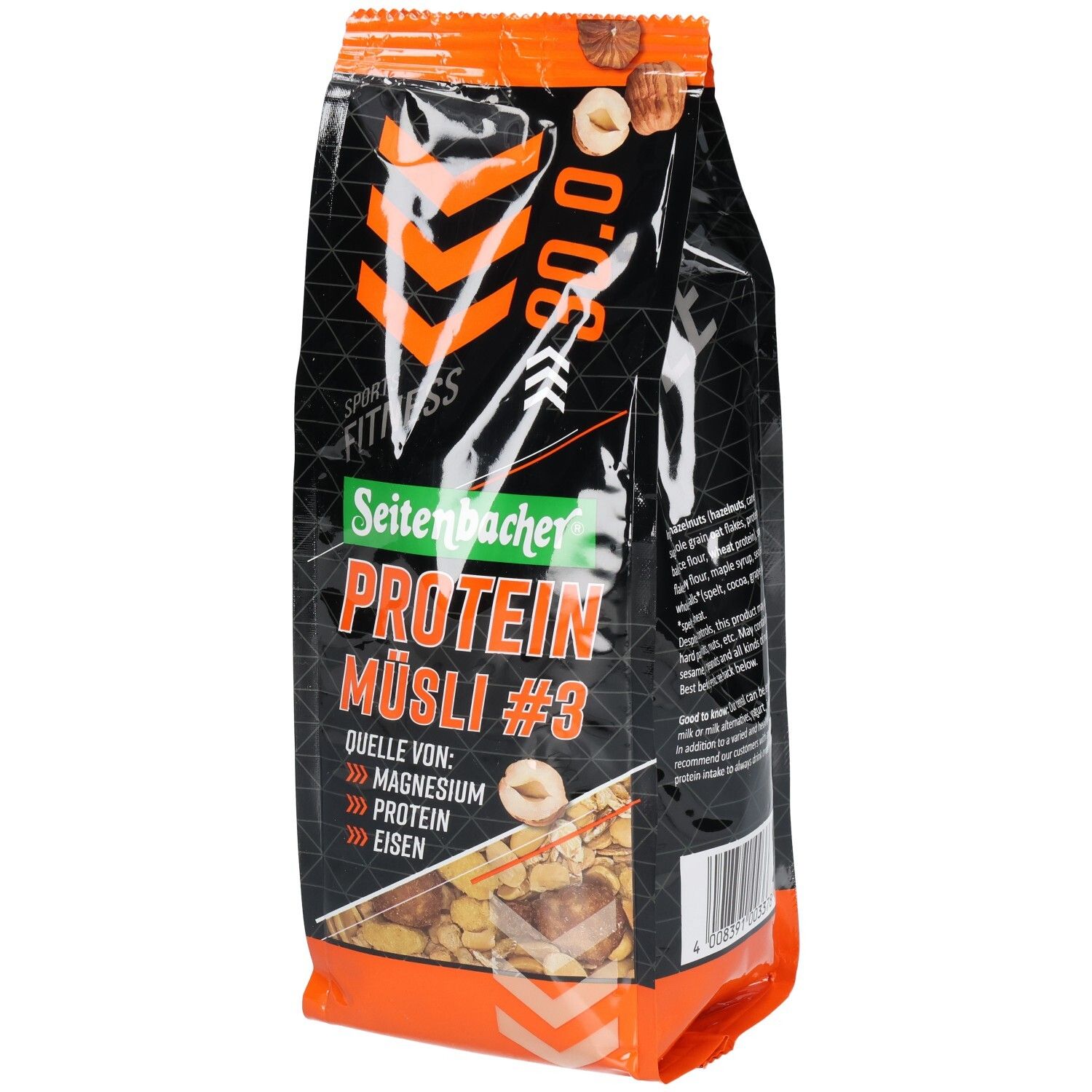 Verpackung von Seitenbacher Protein Müsli #3. Schwarzer Beutel mit orangefarbenen Akzenten. Enthält Magnesium, Protein und Eisen.