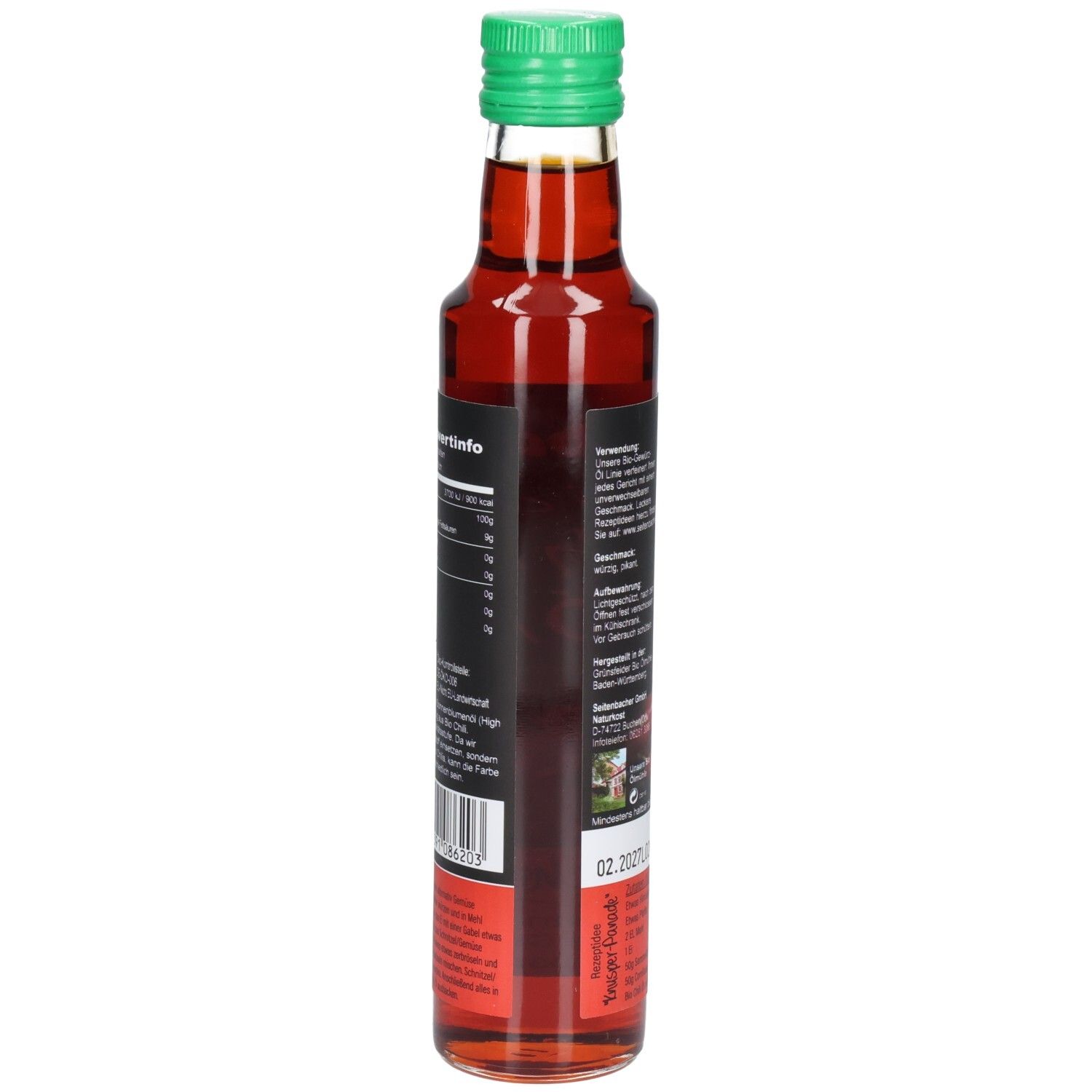 Glasflasche mit grünem Deckel. Etikett mit Nährwertangaben und Chili-Abbildung. Enthält Bio Chili Öl.