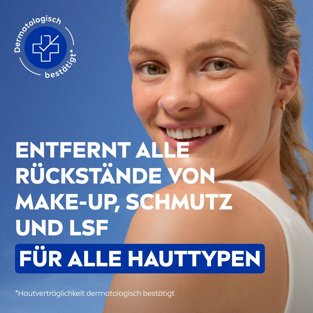 Frau lächelt. Text: Entfernt alle Rückstände von Make-up, Schmutz und LSF. Für alle Hauttypen. Dermatologisch bestätigt.