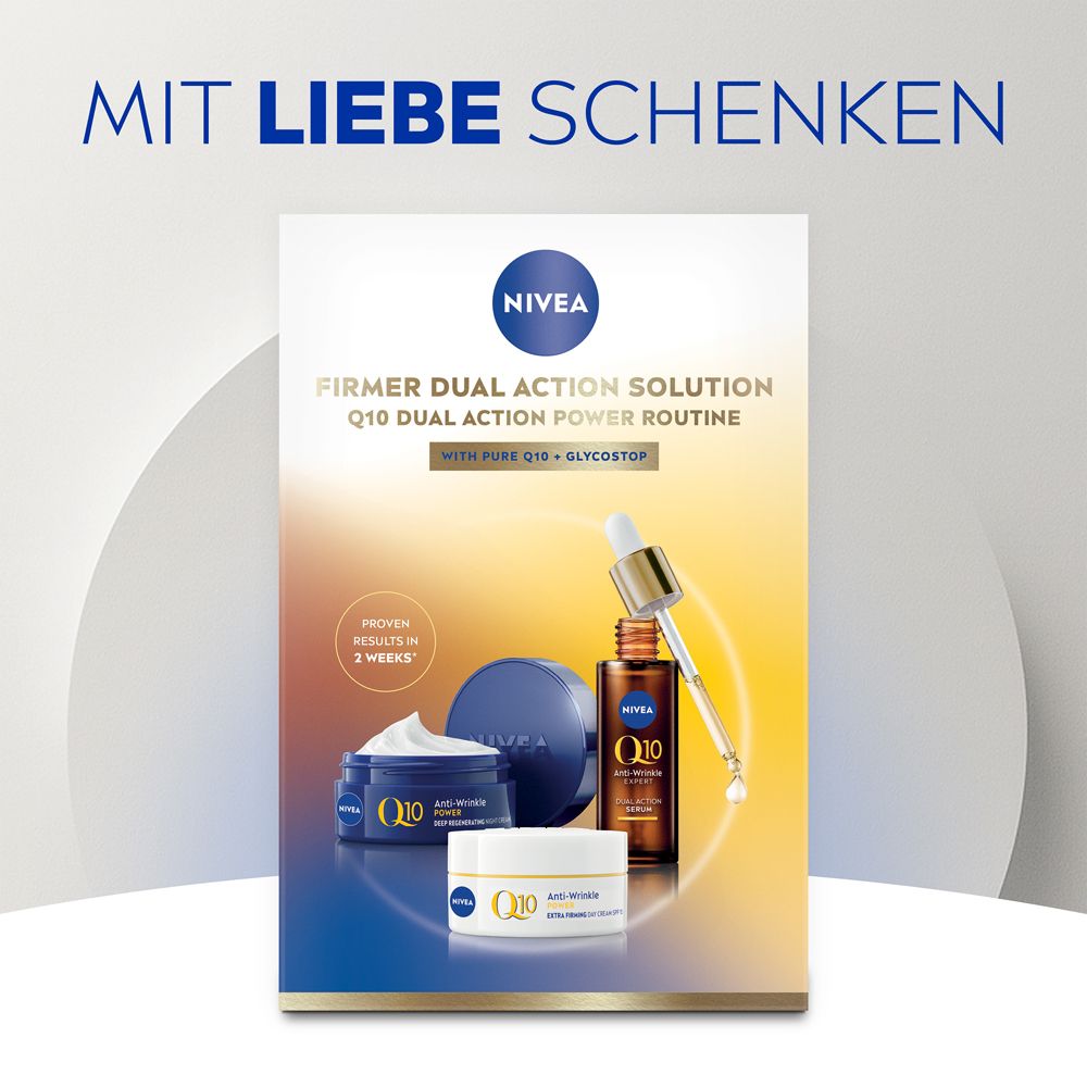 Werbekarte mit NIVEA Q10 Produkten. Zeigt Serum, Tages- und Nachtpflege. Text: Firmer Dual Action Solution.