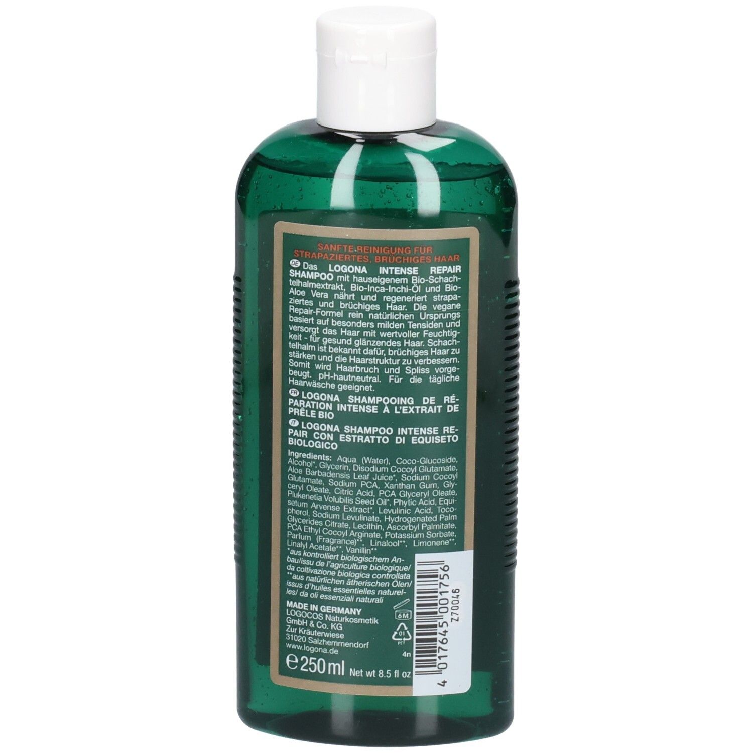 Rückseite der grünen Shampoo-Flasche. Etikett mit Text in mehreren Sprachen, Inhaltsstoffen und Herstellerinformationen.