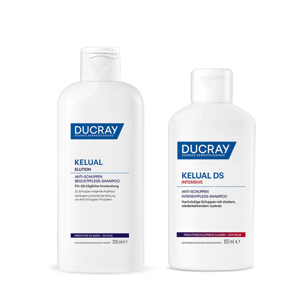 Zwei weiße Flaschen DUCRAY-Shampoo: KELUAL ELUTION und KELUAL DS INTENSIVE. Beide mit blauen und weißen Etiketten.