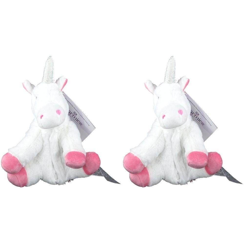Zwei weiße Einhorn-Plüschtiere mit rosa Hufen, Ohren und Herzen. Jedes hat ein Etikett. Das Produkt ist von Warmies.