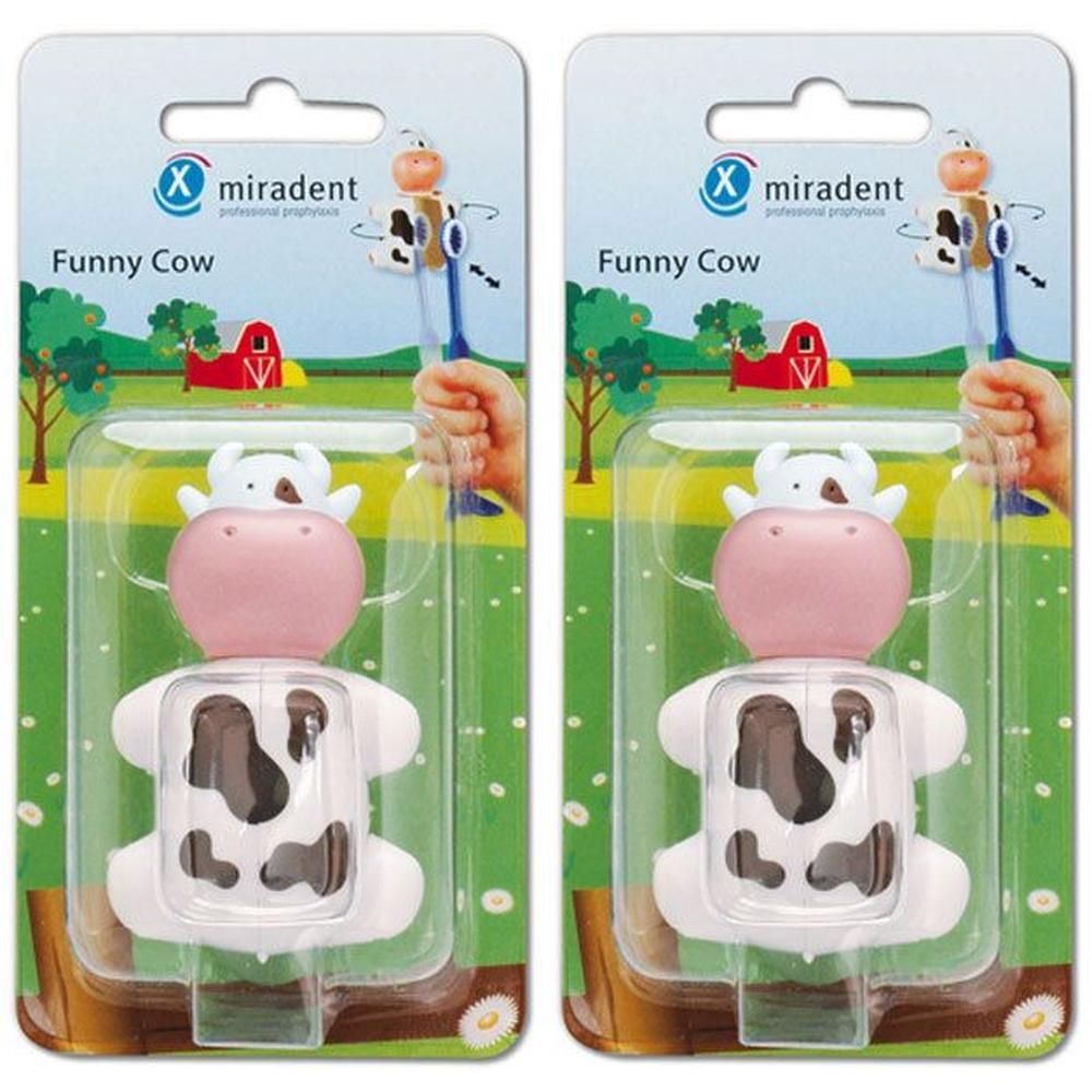Zwei miradent Funny Snap Animals Kuh-Verpackungen. Jede Packung zeigt eine Kuh-Figur mit rosa Kopf und weißem Körper mit Flecken.