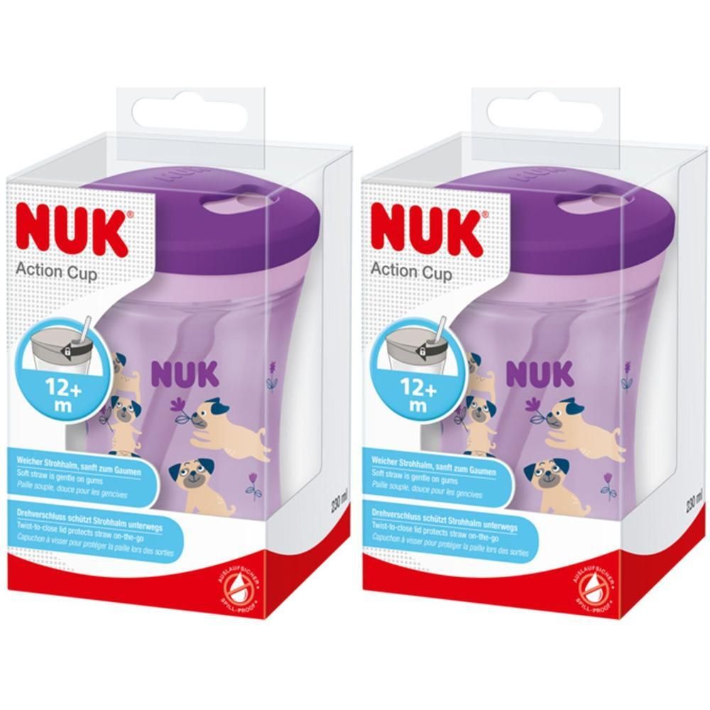 Zwei NUK Action Cups in Verpackung. Lila Deckel, transparente Becher mit Hunde-Motiv. Aufdruck: NUK, 12+ m.