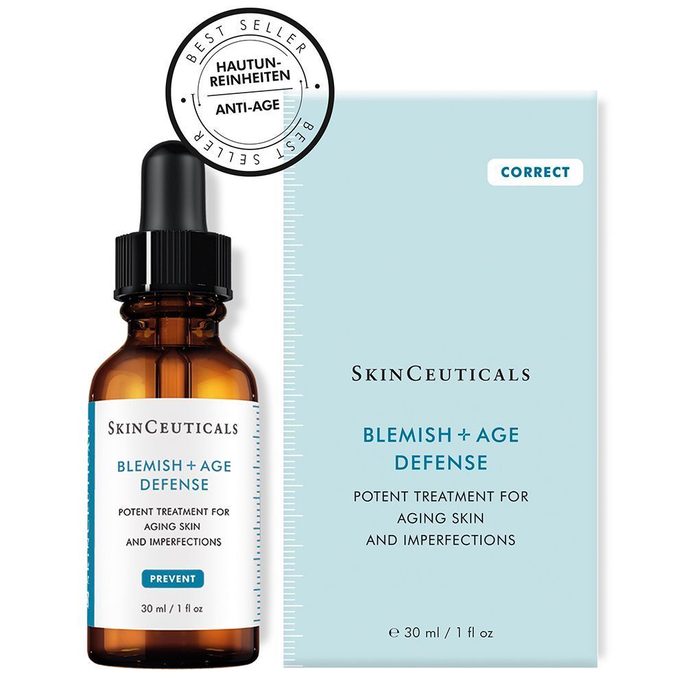 Braune Flasche mit Pipette und hellblauem Karton. Text: Blemish + Age Defense. Aufkleber: Best Seller, Anti-Age.