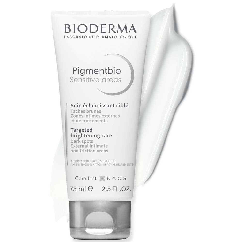 Tube BIODERMA Pigmentbio Sensitive Areas Creme mit Creme-Ausfluss. Weiße Tube mit grauem Deckel. Produktname und Text in Englisch und Französisch.