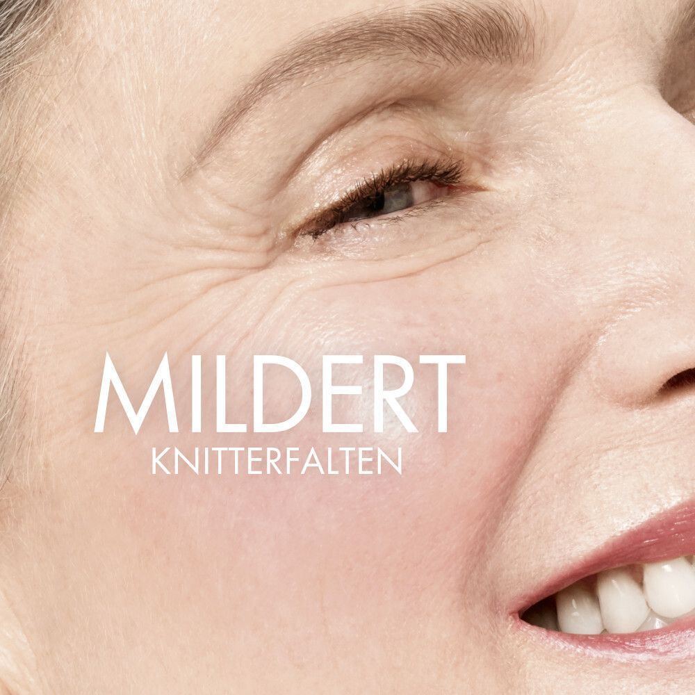 Nahaufnahme eines Gesichts. Text: Mildert Knitterfalten.