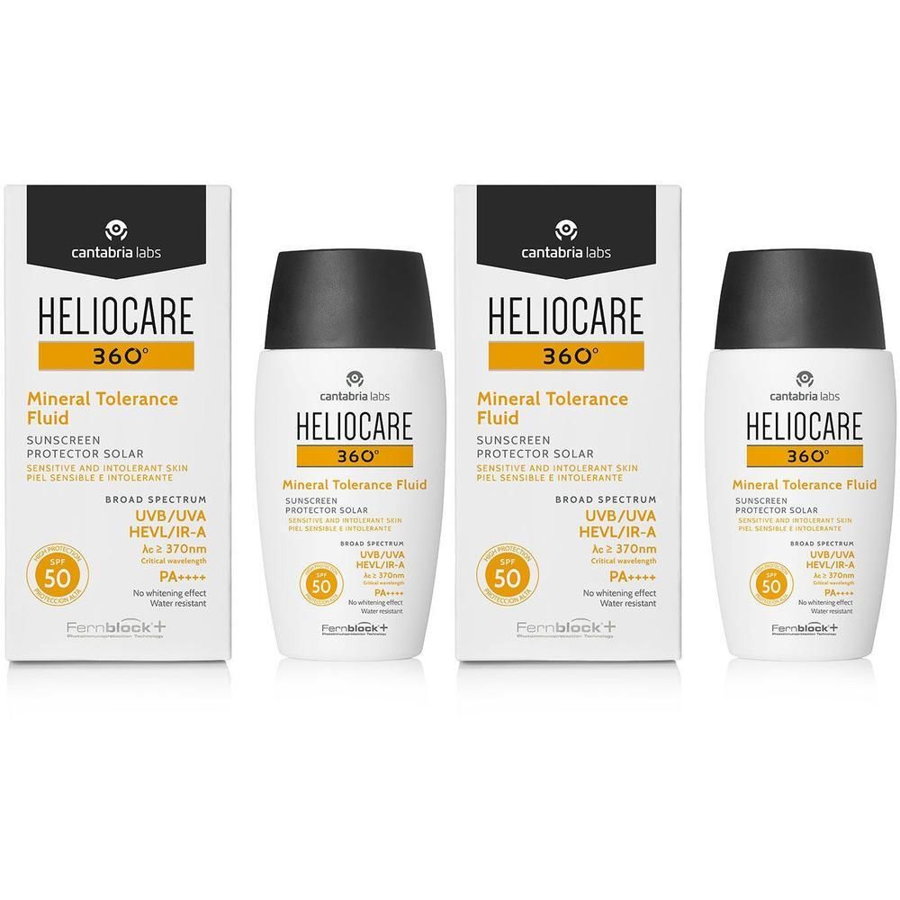 Zwei Packungen und zwei Flaschen HELIOCARE Mineral Tolerance Fluid 360°. Weiße Flaschen mit schwarzem Deckel und gelbem Etikett.