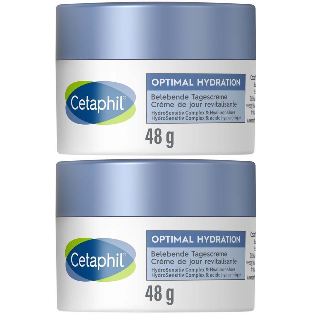 Zwei Cremetiegel mit blauem Deckel. Aufschrift: Cetaphil, Optimal Hydration, 48g.