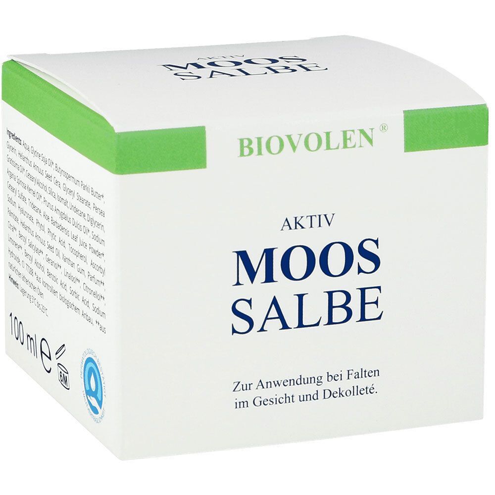 Weißer Karton mit grünen Akzenten. Aufschrift: BIOVOLEN Aktiv Moossalbe. Text: Zur Anwendung bei Falten im Gesicht und Dekolleté.