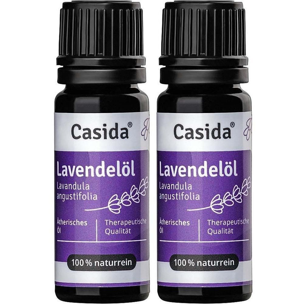 Zwei Flaschen Lavendelöl. Schwarze Glasflaschen mit schwarzem Deckel. Aufschrift: Casida, Lavendelöl, 100% naturrein.