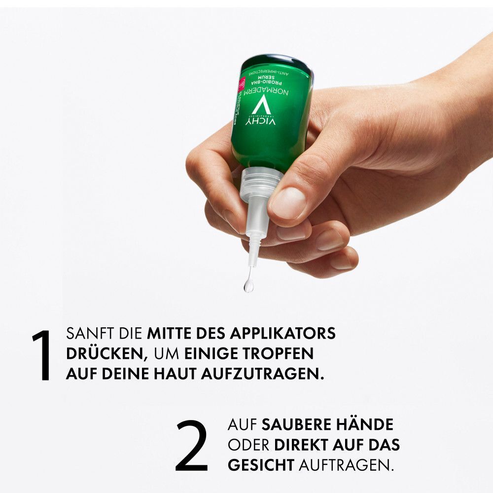 Hände halten eine grüne Flasche. Text: 1. Mitte des Applikators drücken. 2. Auf saubere Hände oder Gesicht auftragen.