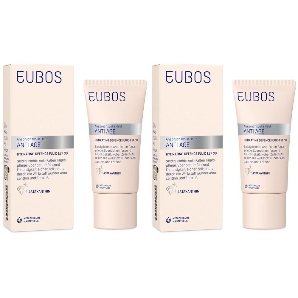 Vier Packungen und Tuben EUBOS ANTI-AGE Hydrating Defence Fluid LSF 30. Verpackung mit Produktinformationen.