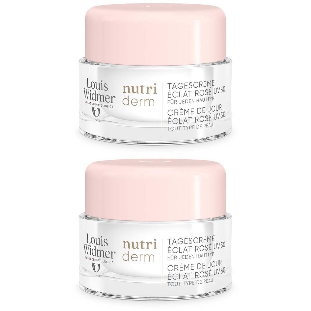 Zwei Tiegel Tagescreme mit rosa Deckel. Aufschrift: nutriderm, Tagescreme Eclat Rose UV 50. Glasbehälter.