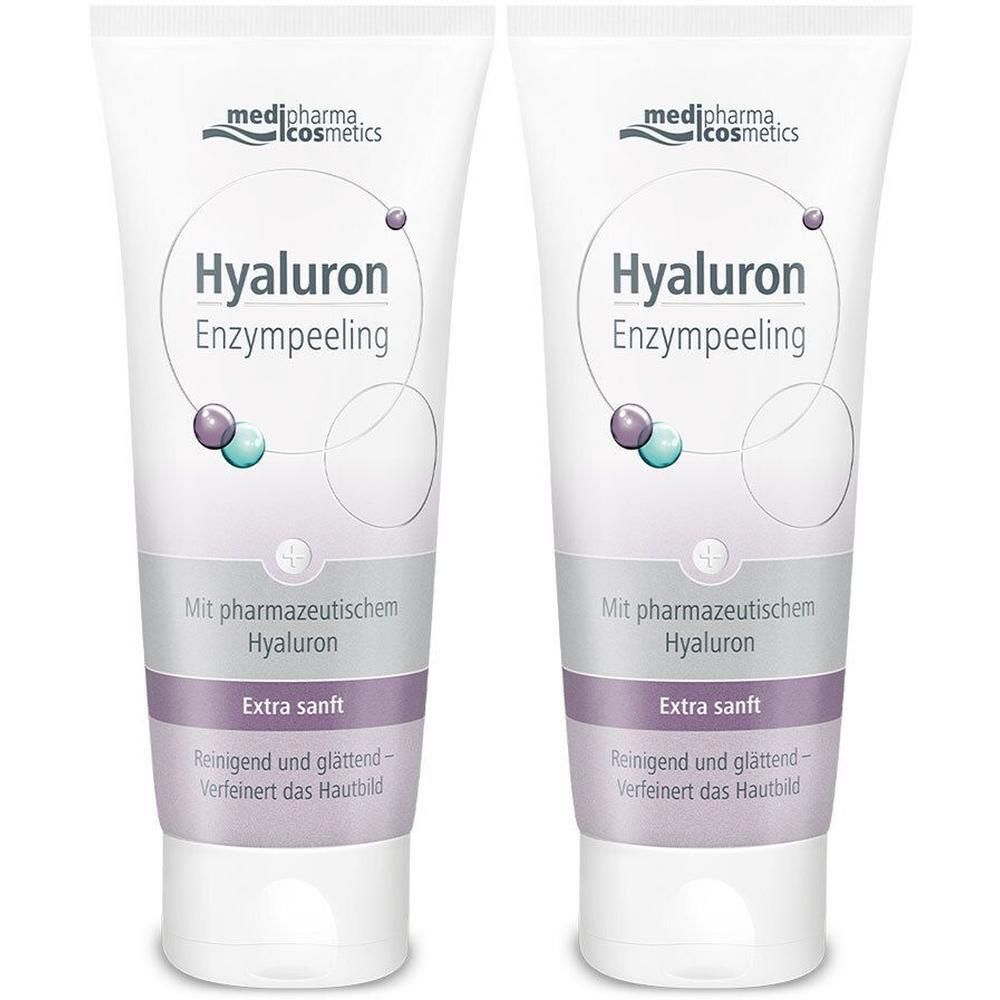 Zwei Tuben HYALURON ENZYMPEELING. Weiße Tuben mit lila und türkisen Dekorationen. Text: Hyaluron Enzympeeling, Extra sanft.