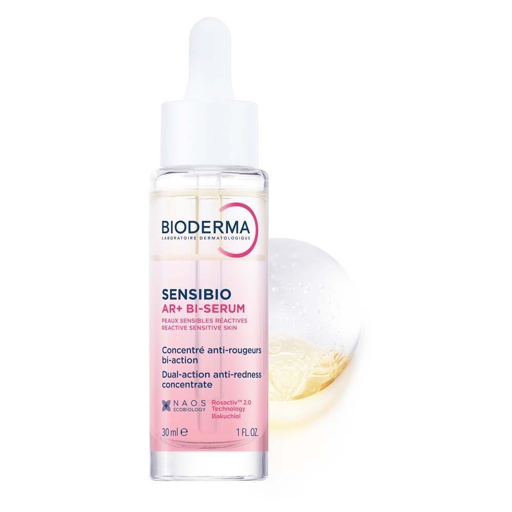 Sensibio AR+ Bi-Serum Flasche mit geöffneter Pipette. Rosa Etikett. Gelbe Flüssigkeit im Hintergrund.