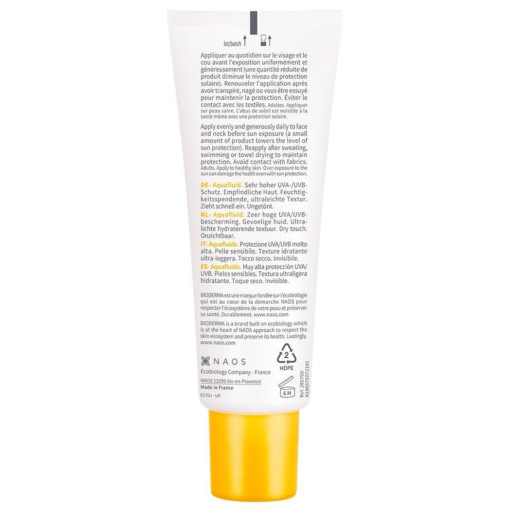 Rückseite einer Tube BIODERMA Photoderm Aquafluide 50+. Text in mehreren Sprachen. Gelber Verschluss.