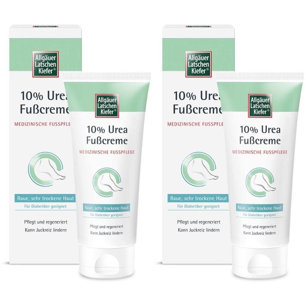Zwei Packungen und zwei Tuben Fußcreme. Aufschrift: 10% Urea Fußcreme. Medizinische Fußpflege. Für raue, sehr trockene Haut.