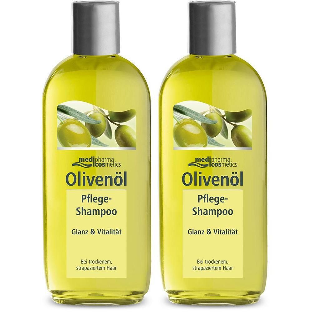 Zwei Flaschen Olivenöl Pflege-Shampoo. Gelbe Flüssigkeit, silberne Kappe, Etikett mit Oliven-Illustration und Schriftzug.