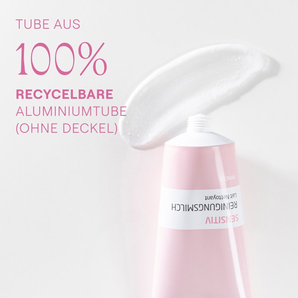 Tube Reinigungsmilch. Rosa Tube mit weißem Deckel. Aufgedrückte Reinigungsmilch. Text: 100% recycelbare Aluminiumtube.