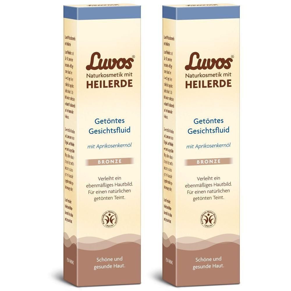 Zwei Produktverpackungen von Luvos getöntes Gesichtsfluid Bronze. Aufschrift: Naturkosmetik mit Heilerde.