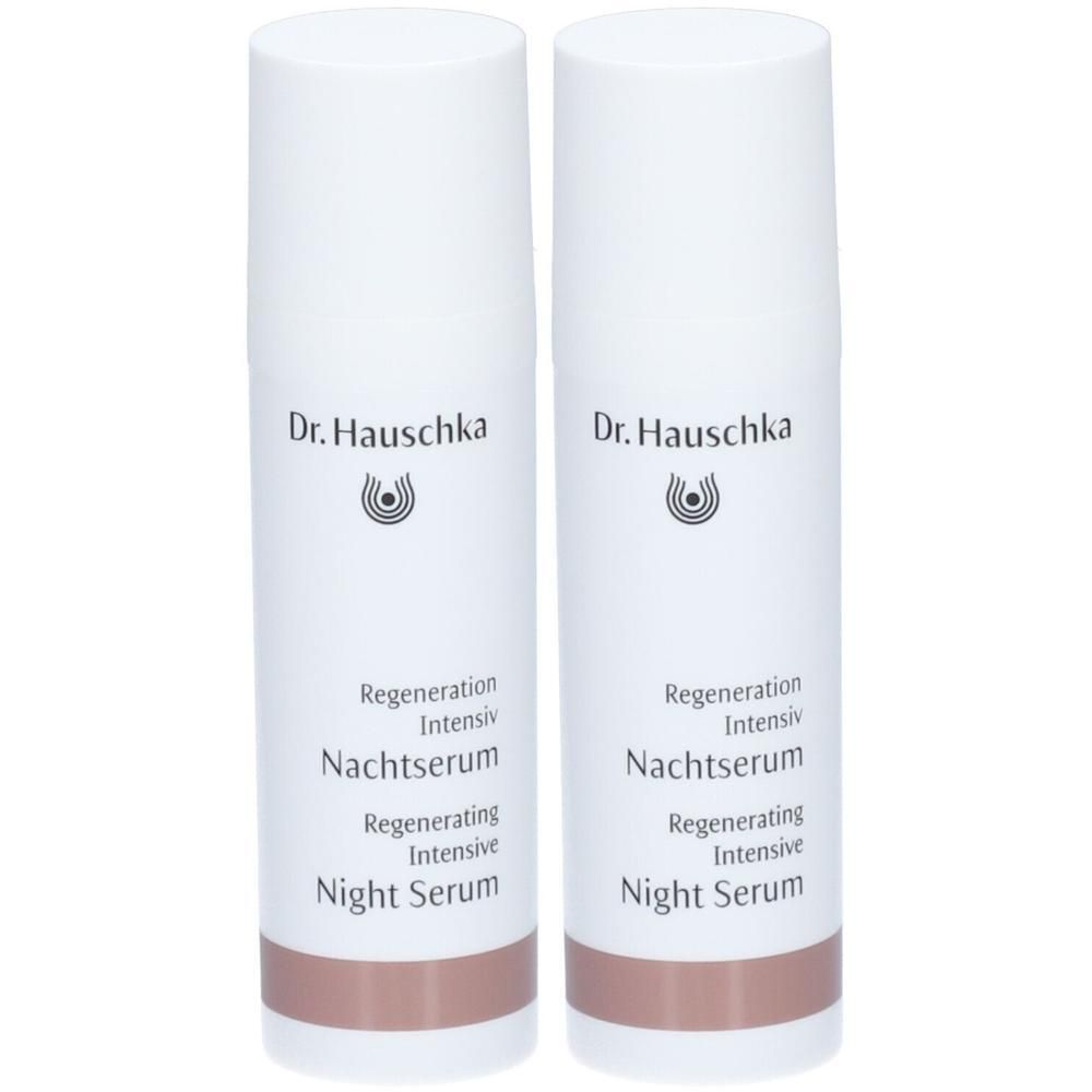 Zwei weiße Flaschen mit braunem Boden. Aufschrift: Dr. Hauschka, Regeneration Intensiv Nachtserum, Regenerating Intensive Night Serum.