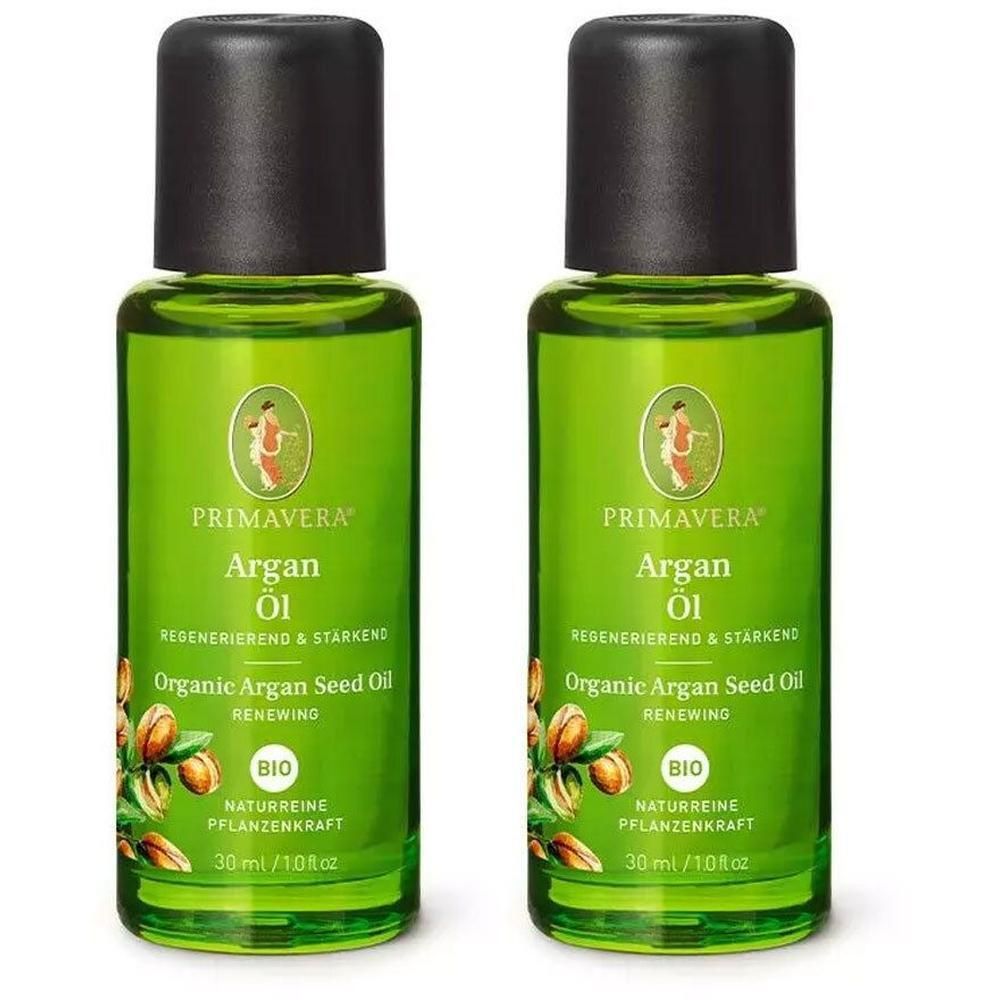 Zwei grüne Glasflaschen mit schwarzem Deckel. Aufschrift: Primavera Argan Öl, BIO. 30 ml.