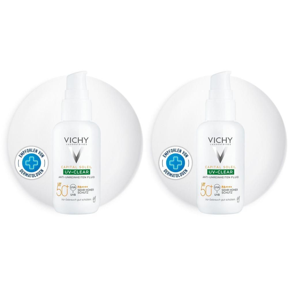 Zwei weiße Flaschen mit Pumpverschluss. Aufschrift: Vichy Capital Soleil UV-Clear LSF 50+. Empfohlen für Dermatologen.