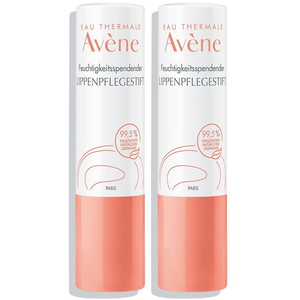 Zwei Lippenpflegestifte. Weißer Stift mit rosa Basis. Aufschrift: Eau Thermale Avène, Feuchtigkeitsspendender Lippenpflegestift. 99,5% natürliche Inhaltsstoffe.