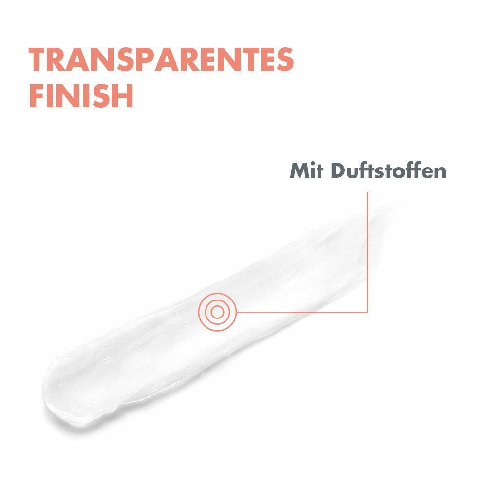 Weißer Lippenpflegestift-Abstrich. Text: Transparentes Finish, Mit Duftstoffen. Roter Kreis.
