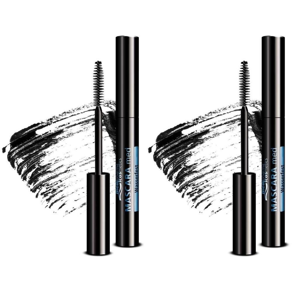 Zwei schwarze Mascara-Tuben mit Bürsten. Aufschrift: MASCARA med wasserfest. Schwarzer Mascara-Strich.