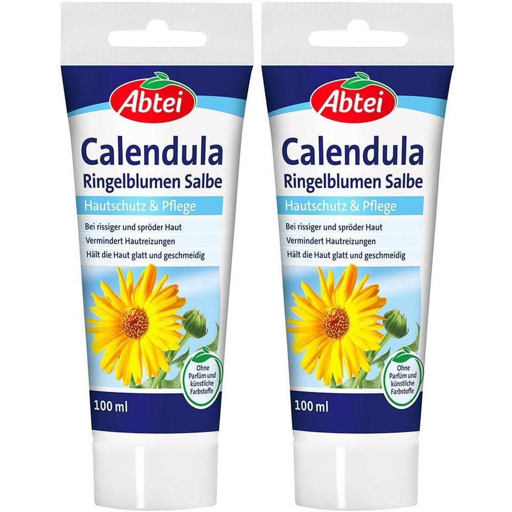 Zwei Tuben ABTEI Calendula Ringelblumen Salbe. Weiße Tuben mit blauer und roter Beschriftung. Enthält eine gelbe Ringelblume.