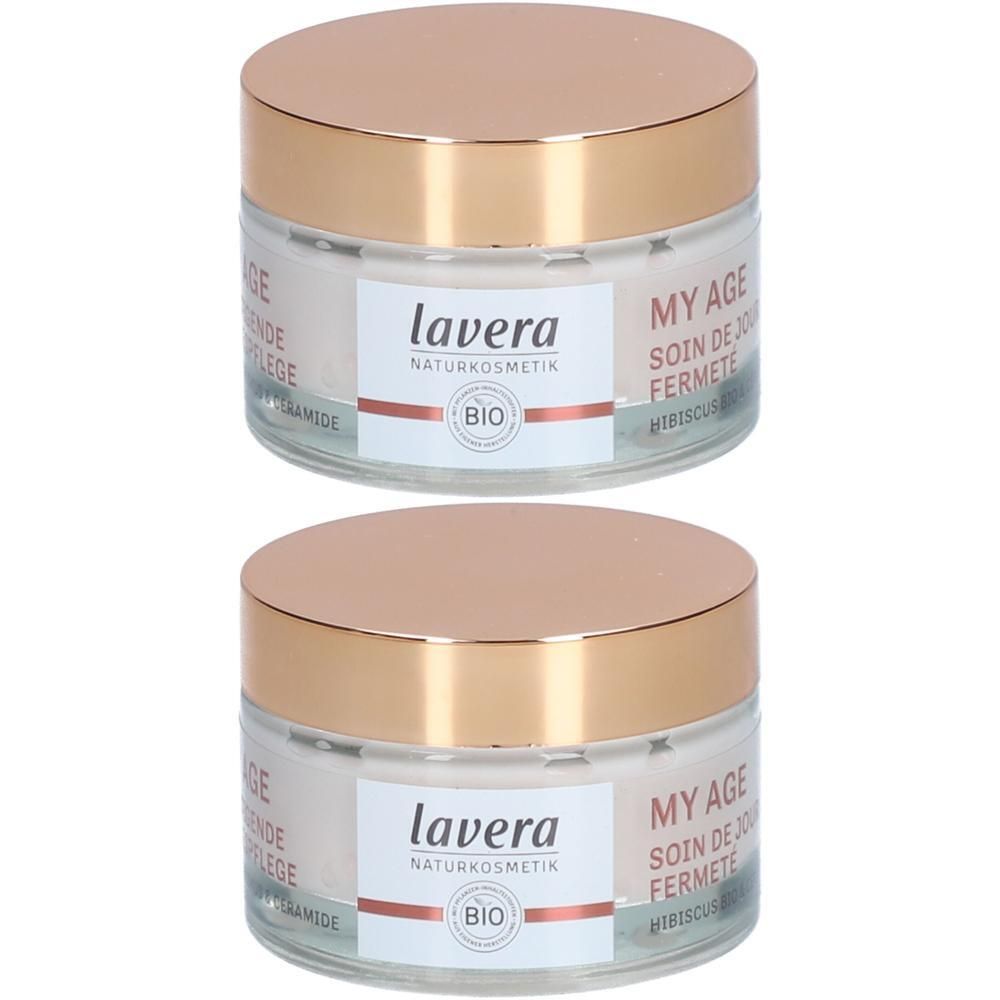 Zwei Cremetiegel mit goldenen Deckeln. Auf den Etiketten steht "lavera NATURKOSMETIK" und "BIO". Text: "MY AGE SOIN DE FERMETE".