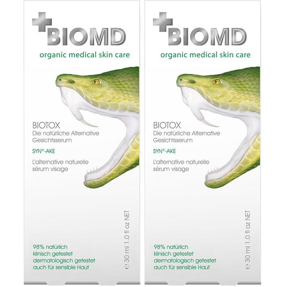 Zwei Verpackungen BioMD Biotox Gesichtsserum. Weiß, mit grünem Schlangenkopf-Design. Text: BIOMD, Biotox, 98% natürlich, 30 ml.